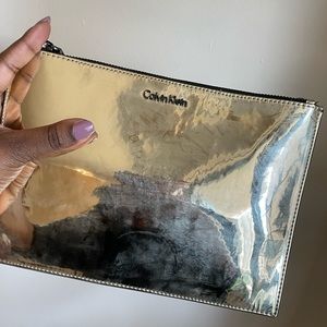 Calvin Klein metallic reflective pouch